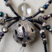 detailed 4" black and silver gray beaded spider 10mm clear glass head, 20mm silver plated body,  movable legs, glass seed beads, flat pose